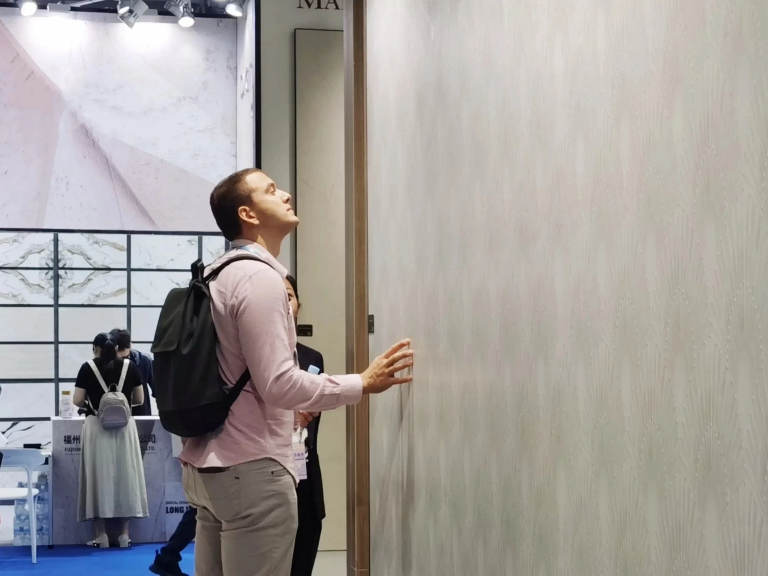 Buyer checking large tile quality, for top 10 ceramic tile manufacturer China