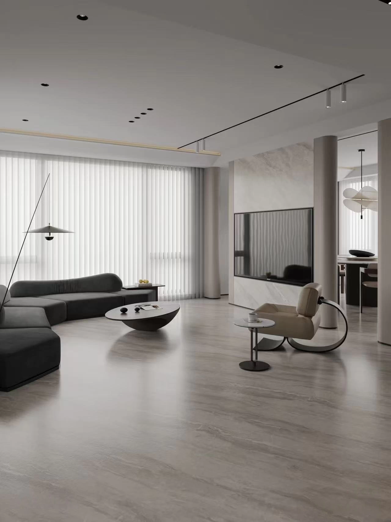 Contemporary lounge using grey wood-look honed tile planks for a calm, low-sheen floor finish