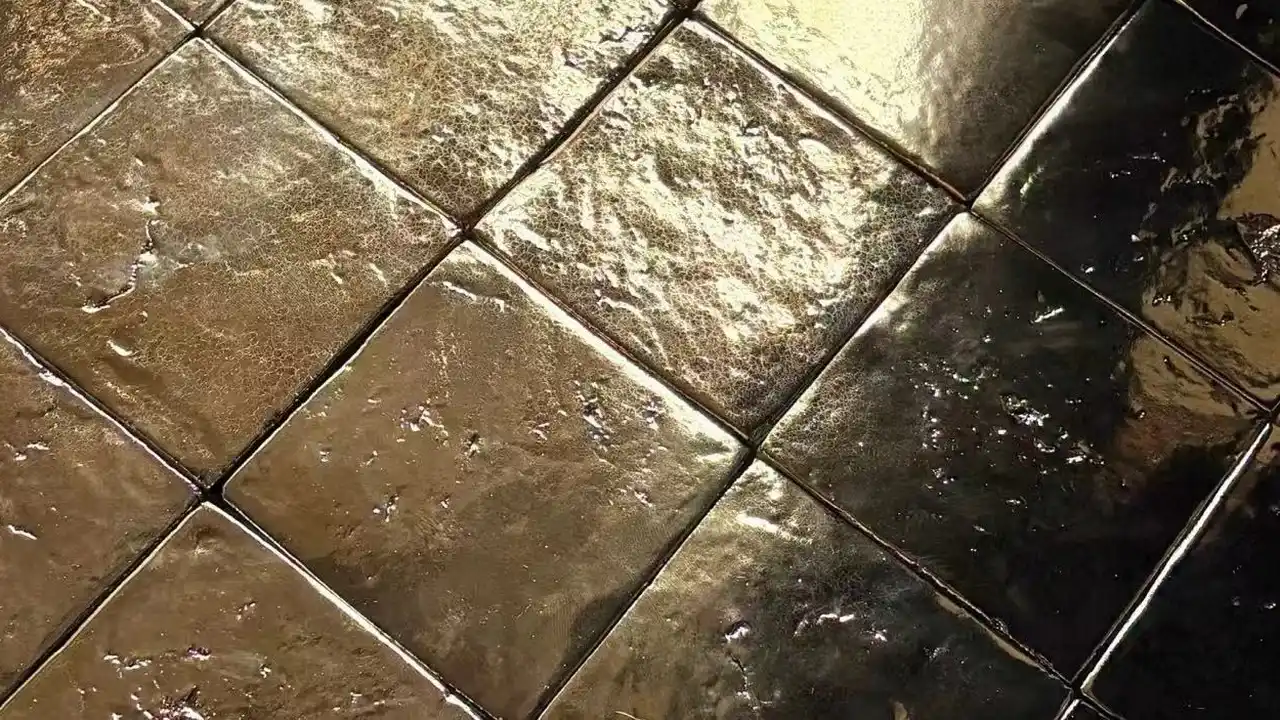 Electroplated metallic tile finish showing glossy reflective tile surface, metallic tile surface