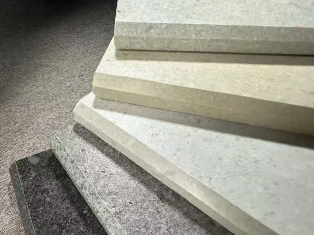 China ceramic tile supplier showing porcelain slab edges in grey and beige tones, anti-slip texture, Foshan floor tile manufacturer