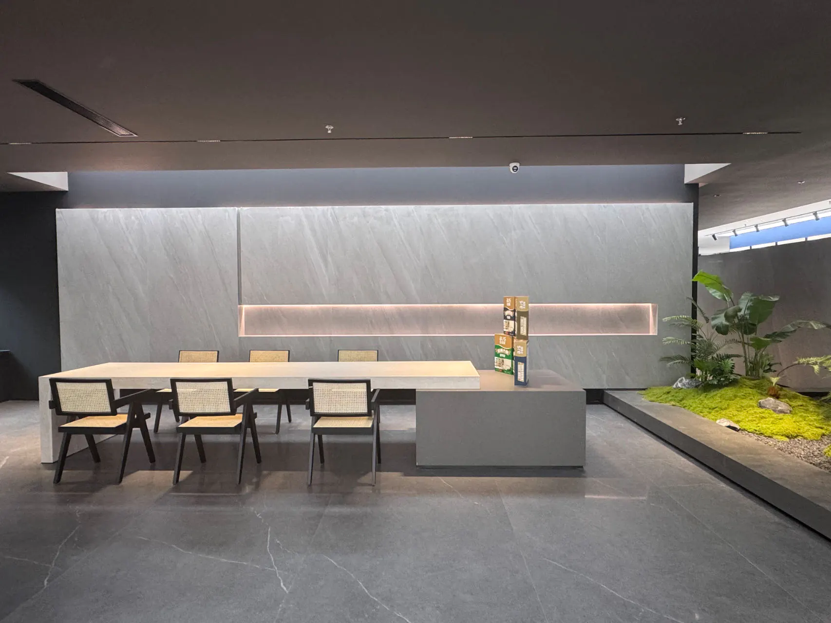 Modern sintered stone dining table with grey texture