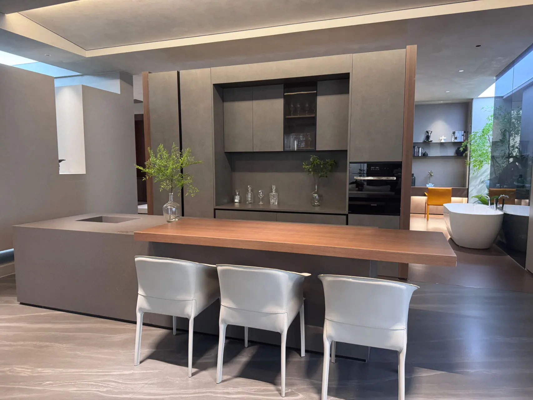Sintered stone kitchen island with wood bar top