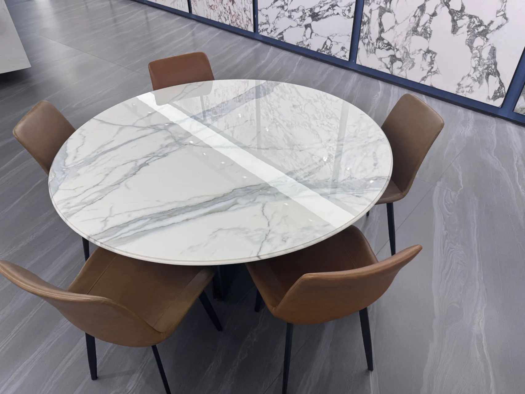Round marble sintered stone dining table with leather chairs