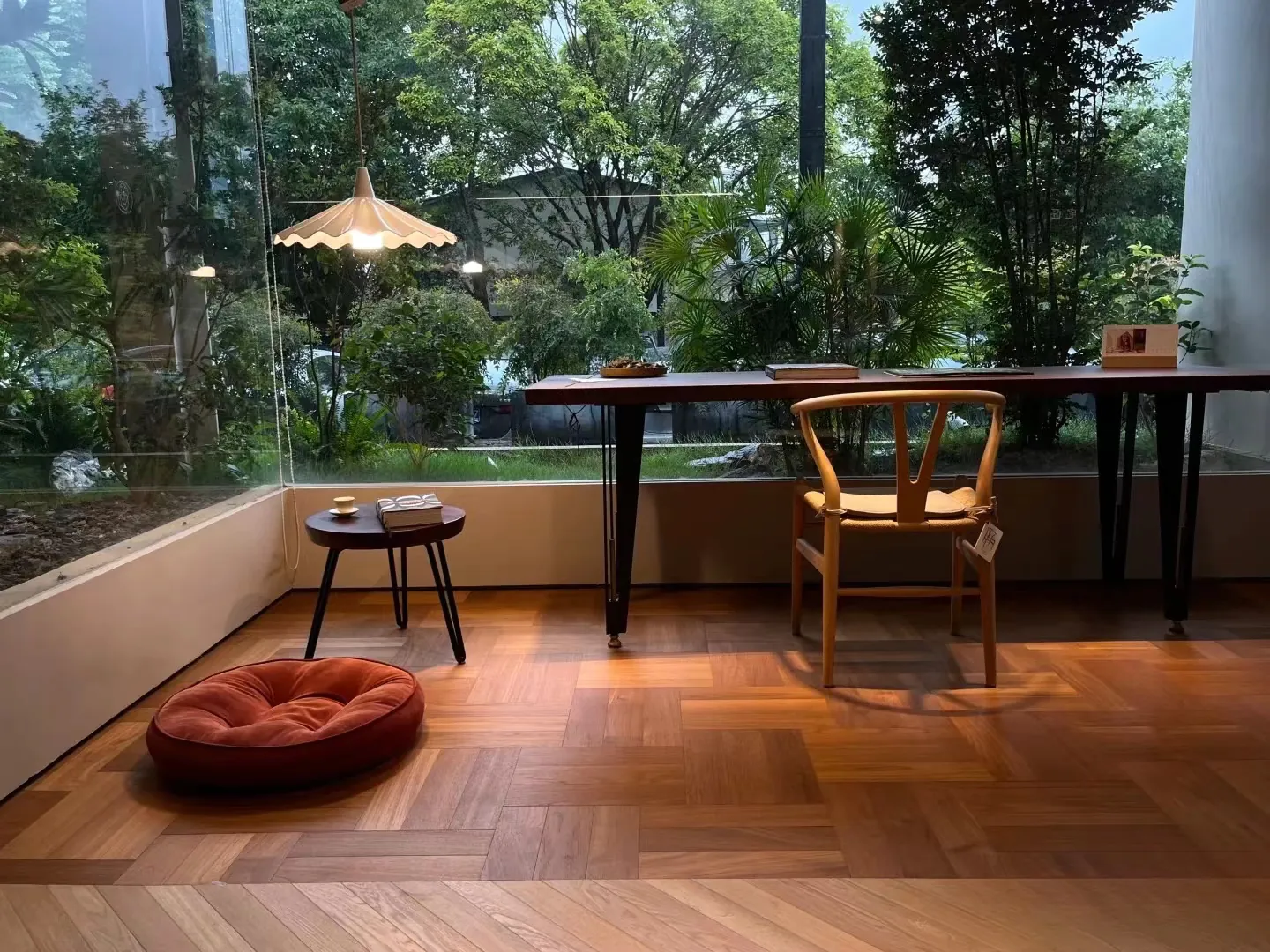 Display wall of chevron and plank wood tile samples in Kingsun China showroom for design inspiration.