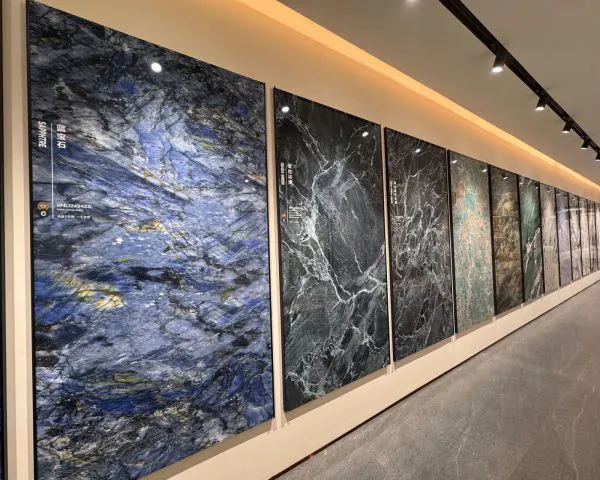 Sintered stone big slab display wall at Kingsun showroom in Foshan, China, marble-look panels for walls and floors.